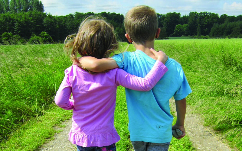 kids, siblings, outside, field_Sing and Speak 4 Kids